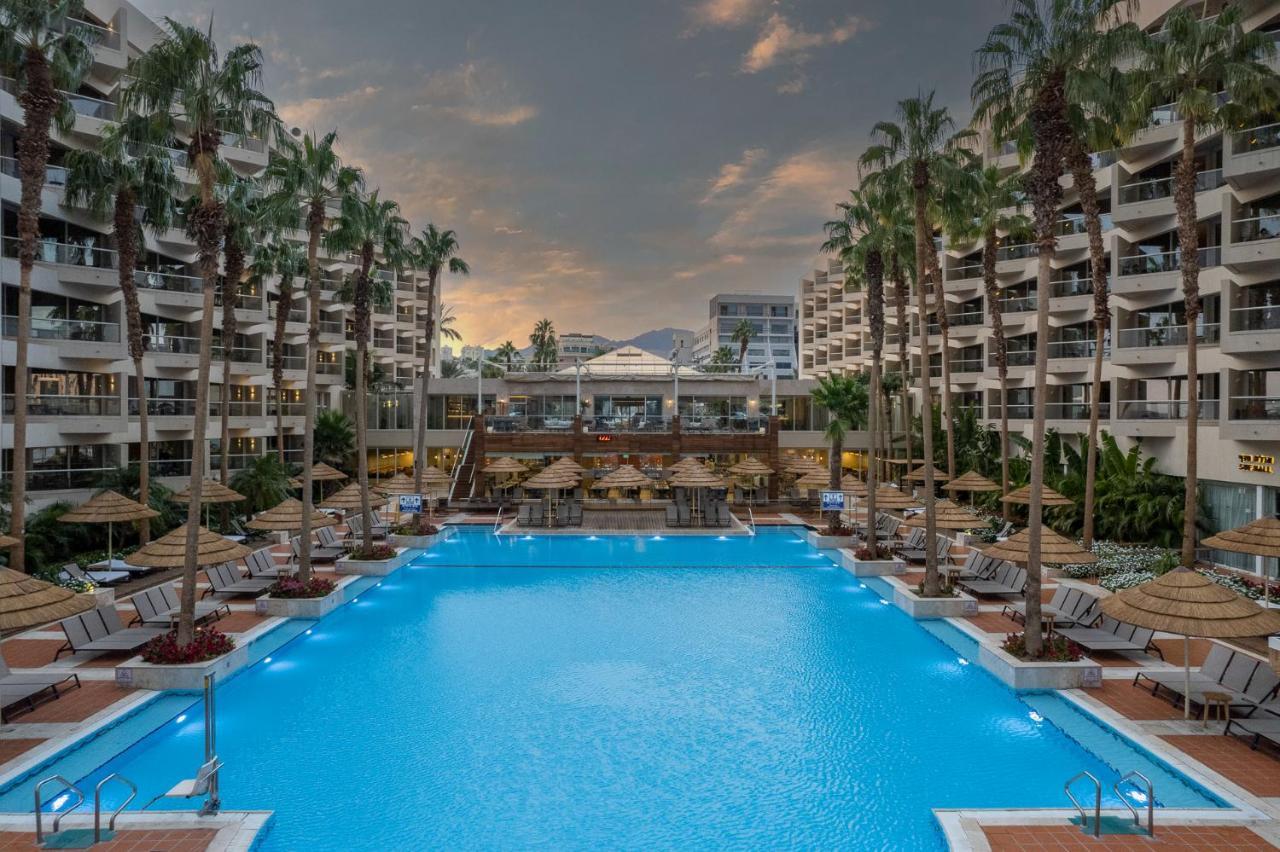 Aria Hotel Eilat Exterior photo The pool at the Grand Resort