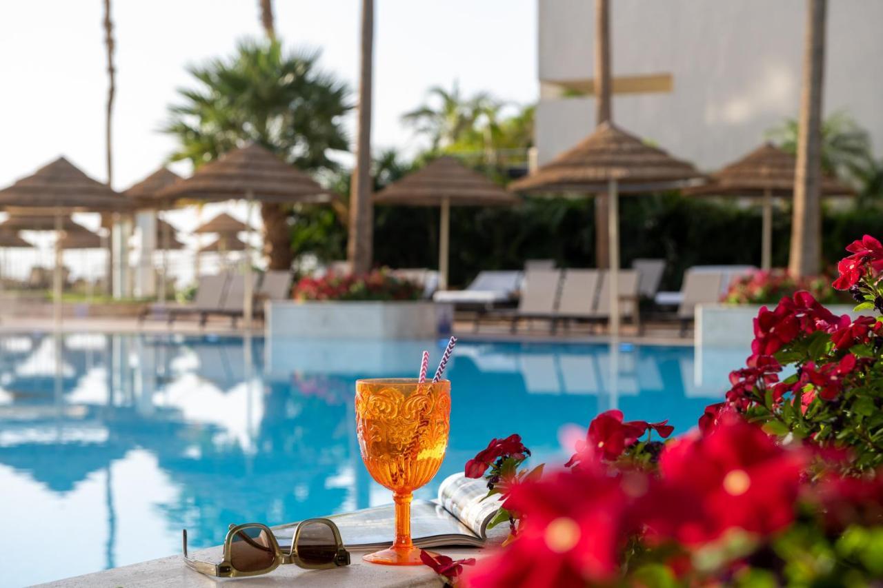Aria Hotel Eilat Exterior photo A glass of Aperol Spritz